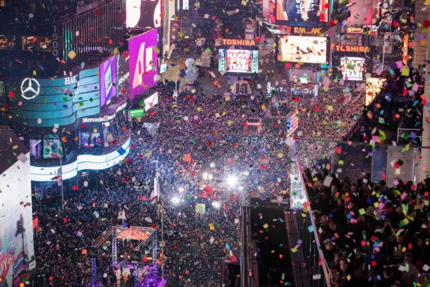 A blizzard of confetti blankets the crowd in this overhead view from the New York Marriott Marquis hotel in Times Square on New Years Eve in this file photo. (Mary Altaffer/AP)