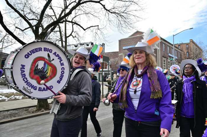 Members of the Queer Big Apple Corps march to the beat of their own drums.