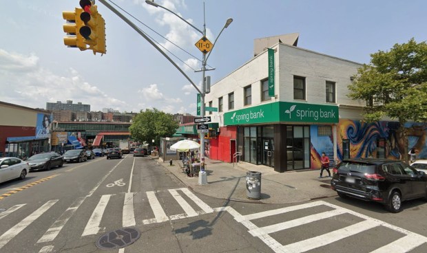 The 46-year-old victim was at her post at the rain-swept corner of Gerard Ave. and E. 167th St. in Highbridge when a man in a black North Face puffer jacket stormed up to her about 8:15 a.m., cops said. (Google)