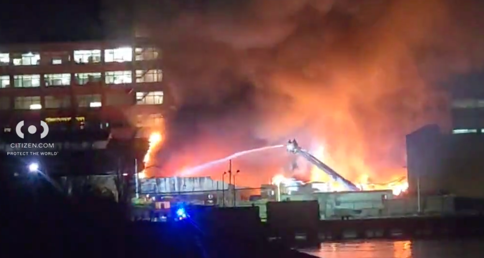 Two firefighters were injured early Wednesday as the FDNY battled a five-alarm fire at factory buildings on the Brooklyn waterfront