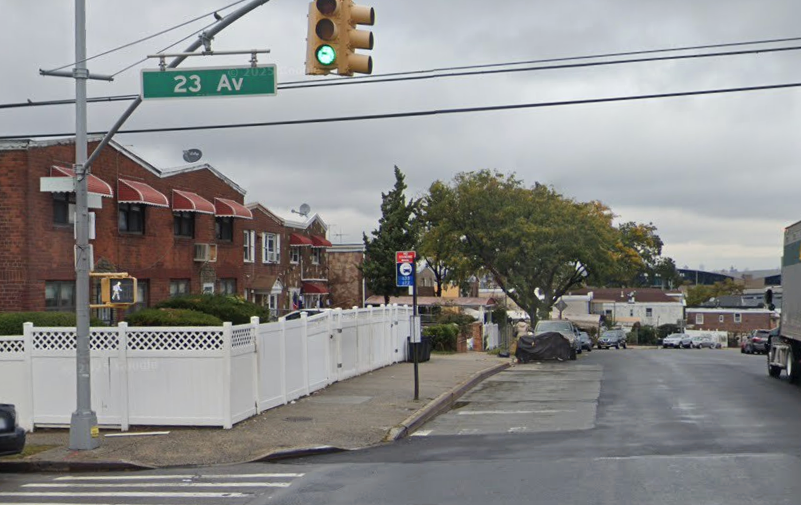 A 30-year-old woman was stabbed at a bus stop in East Elmhurst early Monday morning.
