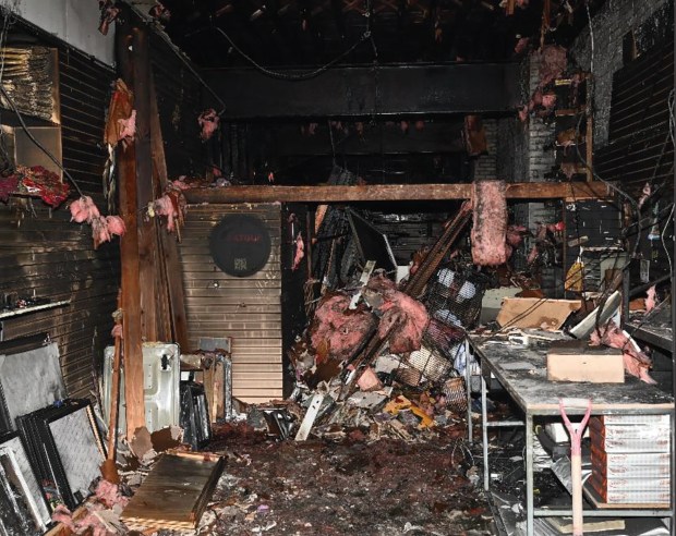 Narinder Singh and Jawahar Singh are accused of setting fire to their print shop on 101st Ave. in Queens, New York, on Feb. 18, 2026. (EDNY)