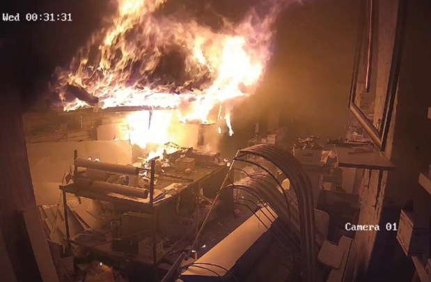 Narinder Singh and Jawahar Singh are accused of setting fire to their print shop on 101st Ave. in Queens, New York, on Feb. 18, 2026. (EDNY)