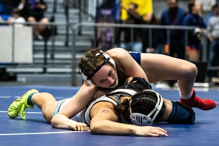 Slifer, Hoeme lead Manhattan High girls' wrestling to 4th at state