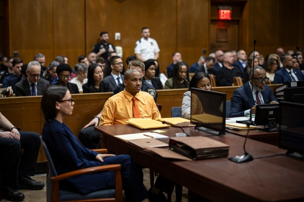 Guy Rivera, charged in the fatal shooting of NYPD Officer Jonathan Diller, listens to opening statements as his trial begins at Queens Criminal Court on Tuesday, March 10, 2026. (Dave Sanders/Pool/The New York Times)