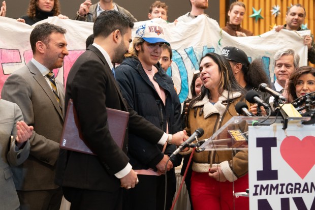 Mayor Zohran Mamdani holds Raiza Contreras' hand during a press conference at Middle Church welcoming her son, Dylan Lopez Contreras, home from ICE detention Wednesday, March 19, 2026 in Brooklyn, New York. (Barry Williams/ New York Daily News)