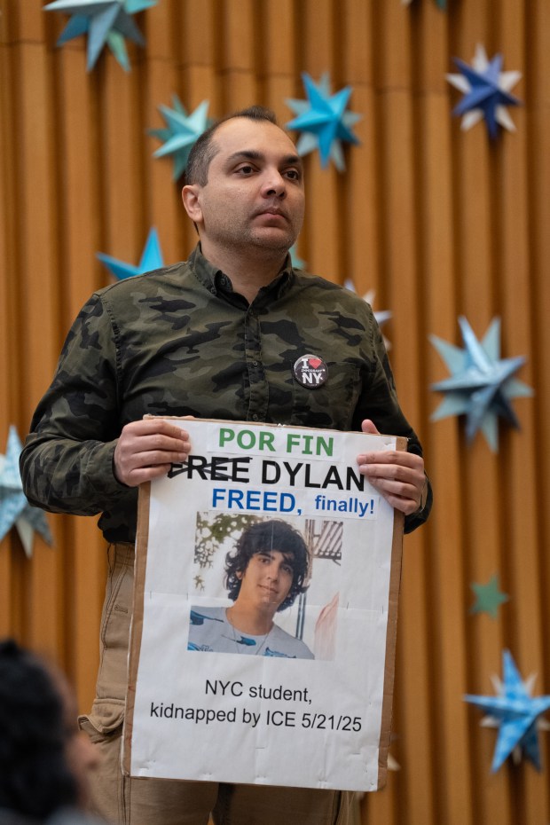 A supporter holds a sign during a press conference at Middle Church welcoming Dylan Lopez Contreras home from ICE detention Wednesday, March 19, 2026 in Brooklyn, New York. (Barry Williams/ New York Daily News)