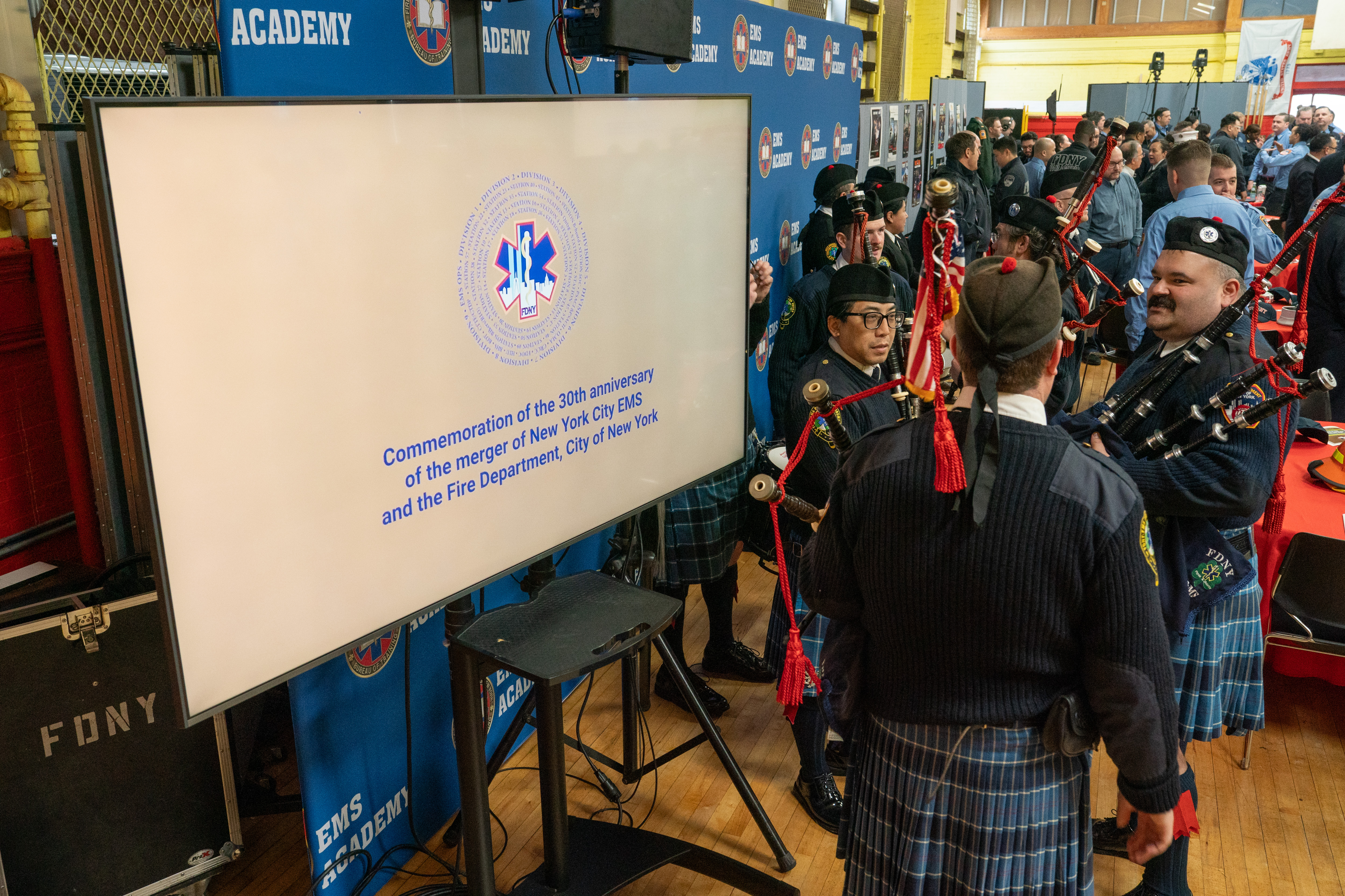 FDNY members gather before a ceremony commemorating the 30th anniversary of the merger of NYC Health and Hospitals EMS with FDNY at the FDNY EMS Bureau of Training in Ft. Totten Park on Monday, March 16, 2026 in Queens, New York. (Barry Williams/ New York Daily News)