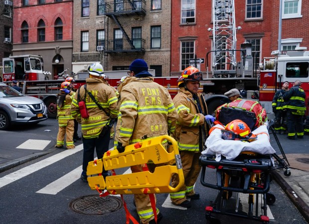 FDNY EMT's are pictured at a fatal fire at 130-142 Waverly Place on Wednesday, March 5, 2025, in Manhattan, New York. (Barry Williams/ New York Daily News)