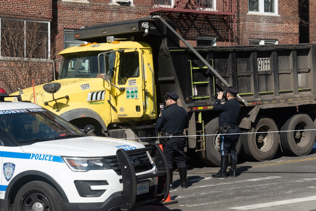 Woman fatally struck in Queens by NYC Transportation Department dump truck