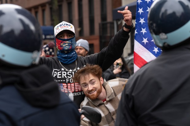 Far-right protestors stir up counter-demonstrators as they wait to get into their van near Gracie Mansion Saturday, March 7, 2026 in Manhattan, New York. (Barry Williams/ New York Daily News)