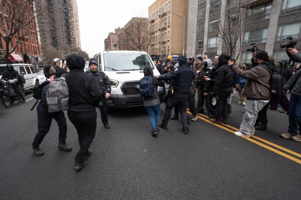 Jake Lang's rental van is surrounded by counter-protesters preventing him and his supporters from leaving the area near Gracie Mansion Saturday, March 7, 2026 in Manhattan, New York. (Barry Williams/ New York Daily News)