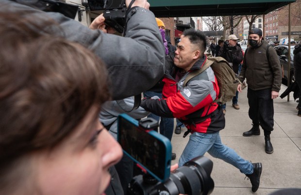 A person throws a punch near Gracie Mansion Saturday, March 7, 2026 in Manhattan, New York. (Barry Williams/ New York Daily News)