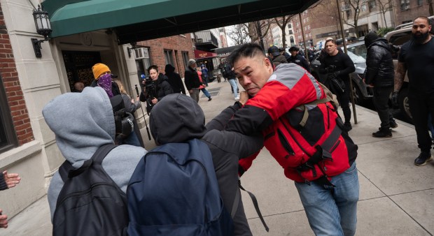 A person throws a punch near Gracie Mansion Saturday, March 7, 2026 in Manhattan, New York. (Barry Williams/ New York Daily News)