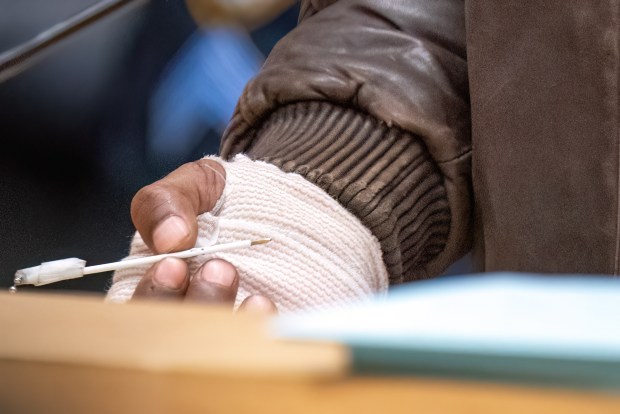 (His right hand is bandaged) 45yr old Juan Rivas, suspect in the stabbing death of his girlfriend Yesenia Hall and the attempted murder of her 16yr old son, is seen here at his Arraignment inside the Criminal Courthouse in the Bronx on Sunday March 1, 2026, 2026. 1236. (Theodore Parisienne / New York Daily News)