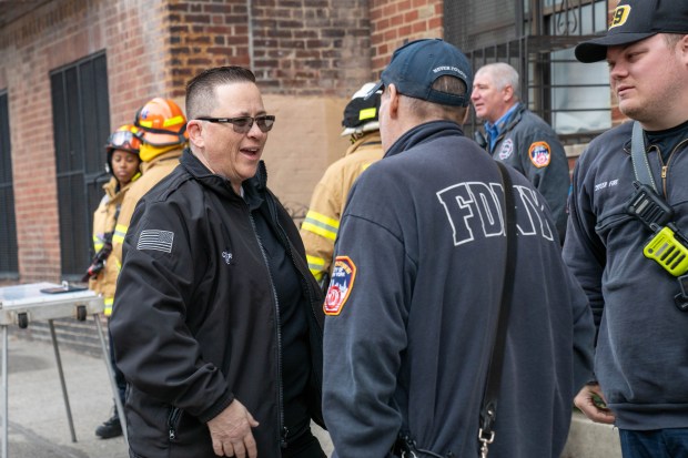 FDNY Commissioner Lillian Bonsignore, left, is pictured after a two-alarm fire inside an FDNY firehouse, home to Battalion 27, Engine 79 and Ladder 37, in the Bronx on Friday, March 27, 2026. (Theodore Parisienne / New York Daily News)