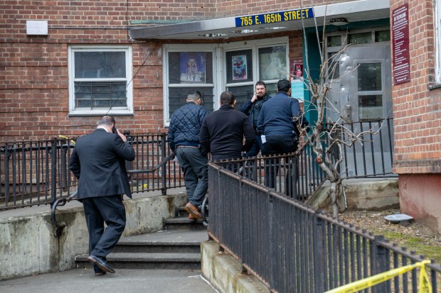Police investigate after a man was fatally shot inside a Bronx apartment building on Friday morning. 