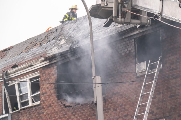 Three people were killed, including a child of unknown age, with several others suffering serious injuries, after a four-alarm fire broke out inside a two story residence at 44-49 College Point Boulevard in Queens on Monday March 16, 2026. 1309. (Theodore Parisienne / New York Daily News)