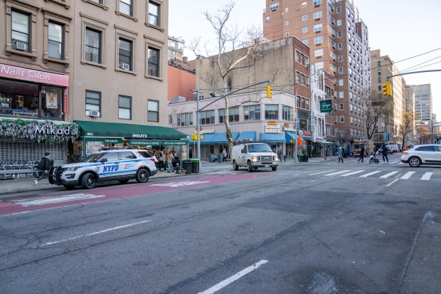 Police investigate after a hit-and-run driver fatally struck a 44-year-old man on E. 61st St. and Lexington Ave. Friday morning.