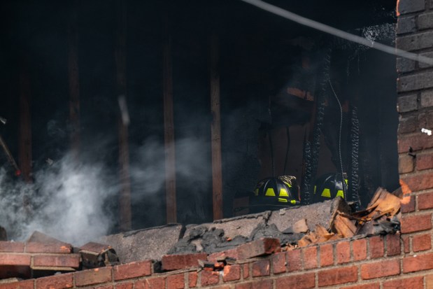 Three people were killed, including a child of unknown age, with several others suffering serious injuries, after a four-alarm fire broke out inside a two story residence at 44-49 College Point Boulevard in Queens on Monday March 16, 2026. 1309. (Theodore Parisienne / New York Daily News)
