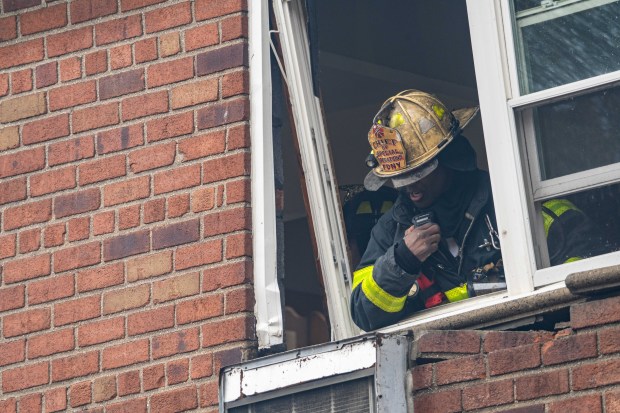 Three people were killed, including a child of unknown age, with several others suffering serious injuries, after a four-alarm fire broke out inside a two story residence at 44-49 College Point Boulevard in Queens on Monday March 16, 2026. 1309. (Theodore Parisienne / New York Daily News)