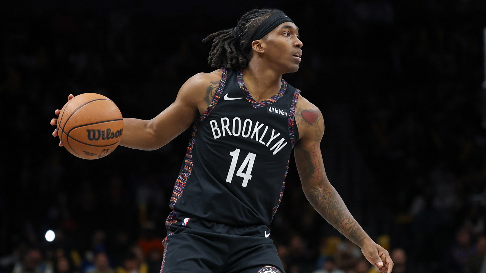 Nov 24, 2025; Brooklyn, New York, USA; Brooklyn Nets guard Terance Mann (14) dribbles up court during the second half against the New York Knicks at Barclays Center. Mandatory Credit: Vincent Carchietta-Imagn Images