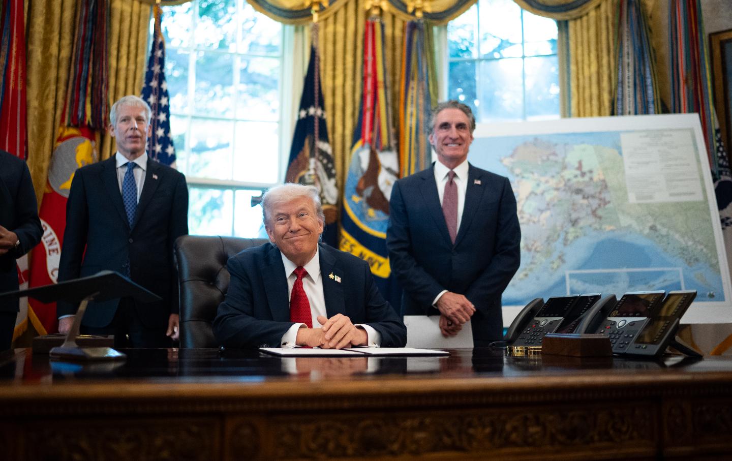 President Donald Trump speaks to the press in October after signing an executive order to allow construction of an access road to the Ambler mining district in Alaska.