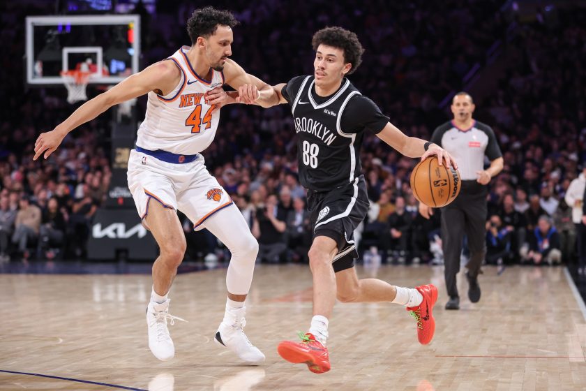 Jan 21, 2026; New York, New York, USA; Brooklyn Nets guard Nolan Traore (88) looks to drive past New York Knicks guard Landry Shamet (44) in the third quarter at Madison Square Garden.