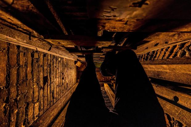 A passageway, believed to have been used as part of the Underground Railroad, is hidden in the base of a dresser inside the Merchant's House Museum in New York on Feb. 19, 2026. (Max Touhey/Merchant's House Museum via AP)