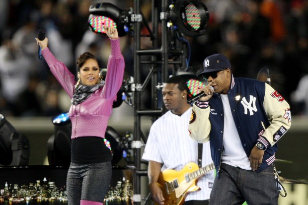 Rapper Jay-Z, right, and singer Alicia Keys perform before Game Two of the 2009 MLB World Series at Yankee Stadium on Oct. 29, 2009 in the Bronx. (Jed Jacobsohn / Getty Images)