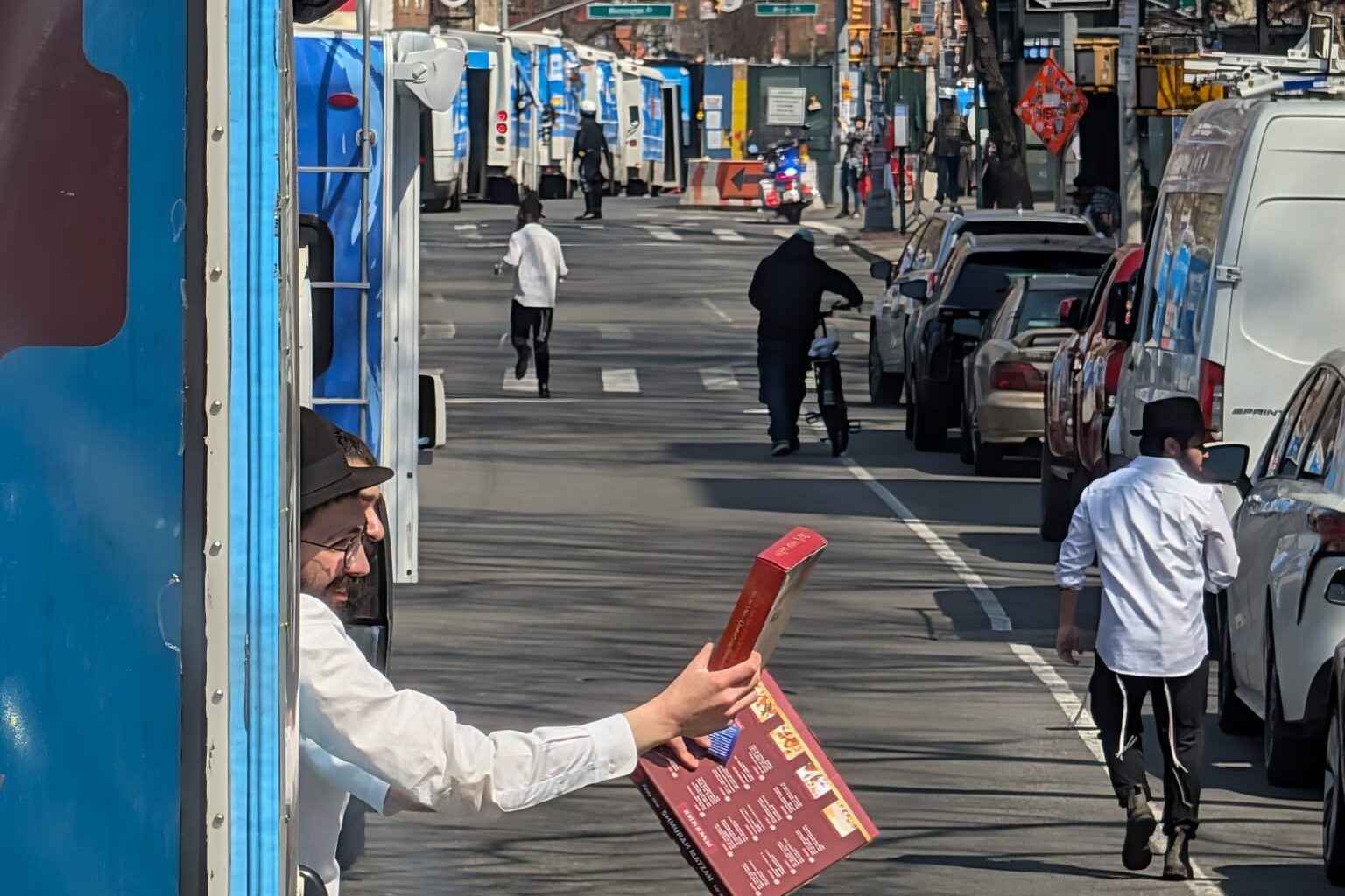 Mitzvah Tank Parade Crosses the Brooklyn Bridge into Manhattan