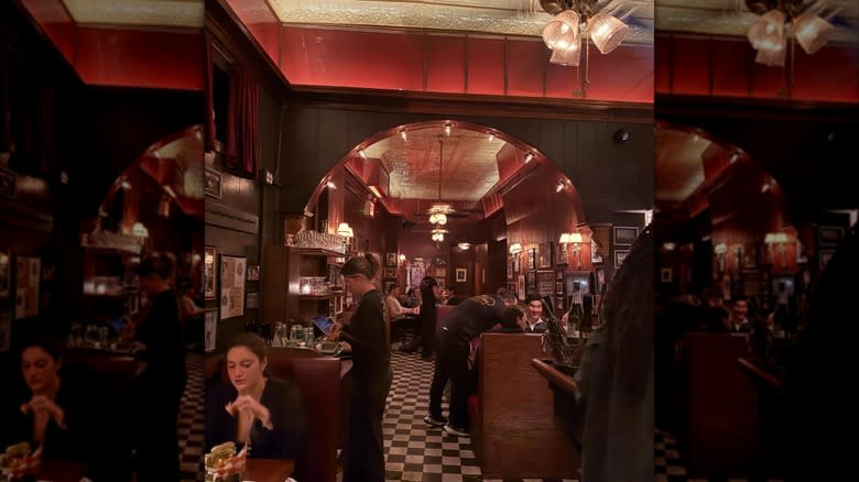 Red-accented interior of JR & Son in Brooklyn, NY