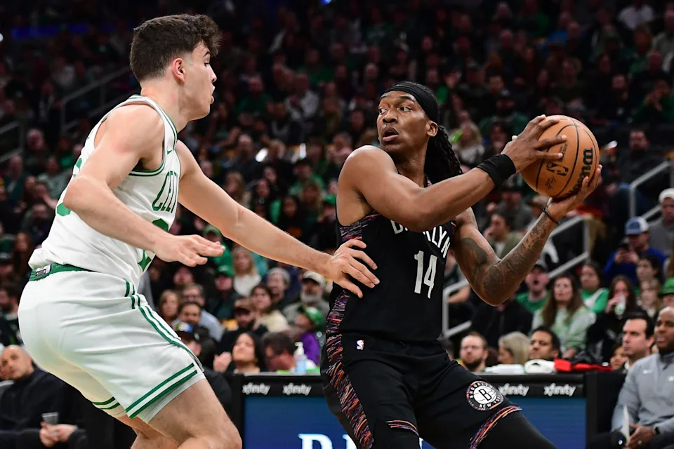 Feb 27, 2026; Boston, Massachusetts, USA; Brooklyn Nets guard Terance Mann (14) controls the ball from Boston Celtics guard Hugo Gonzalez (28) during the first half at TD Garden. Mandatory Credit: Bob DeChiara-Imagn Images