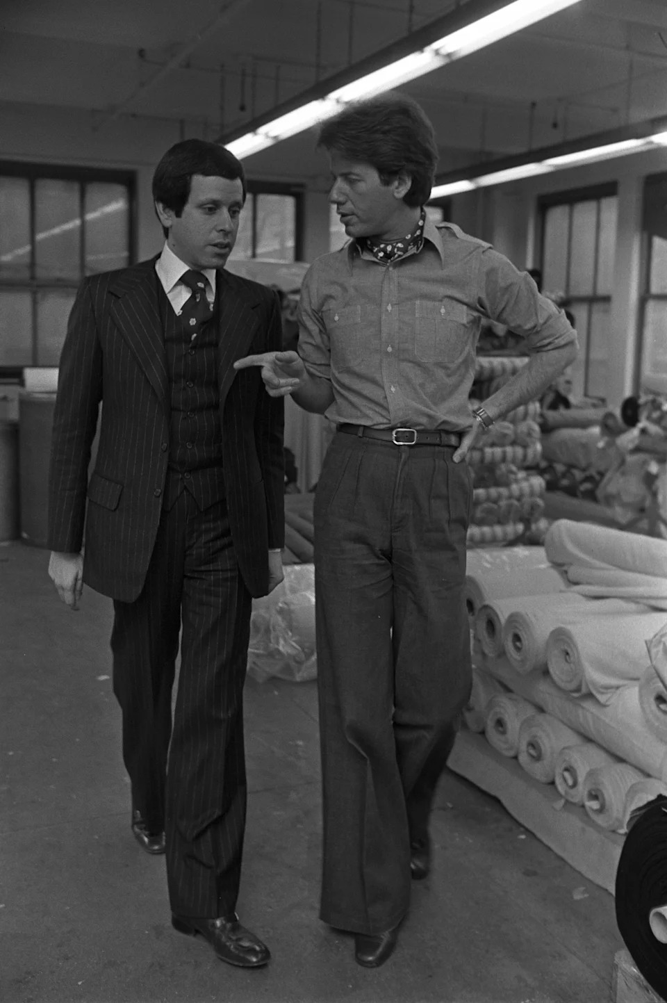 Calvin Klein and Barry Schwartz at the Calvin Klein design studio and showroom in New York City's Garment District on January 14, 1975.
