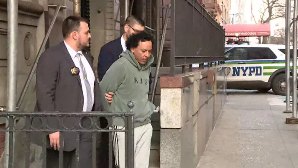 Bairon Hernandez, 34, seen in NYPD custody