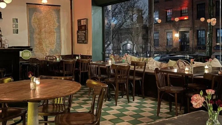 A dining room is decorated with an old map.