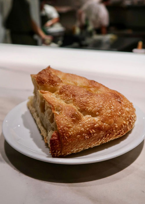 Chambers' sesame pizza bianca is one of the best wine bar snacks in NYC.