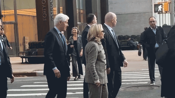 Bill Clinton appears to nudge Hillary toward NYC intersection in viral video