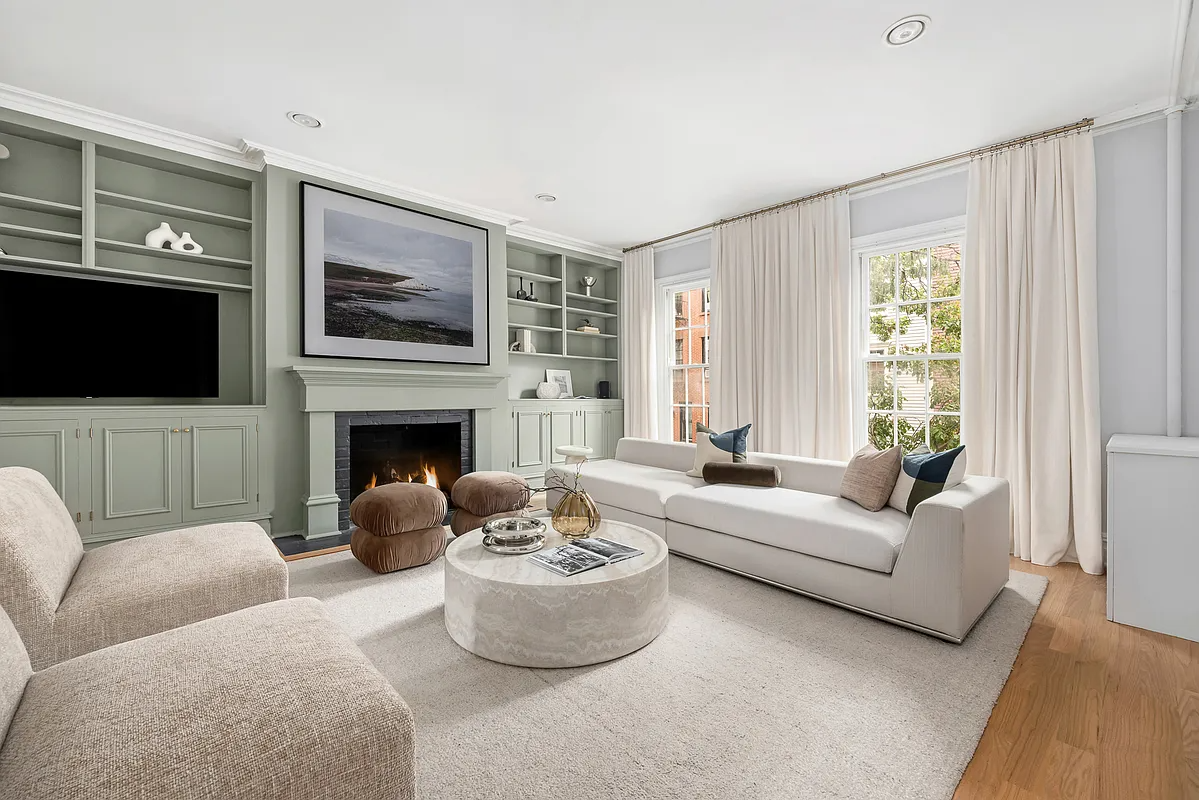 living room with wall of built ins