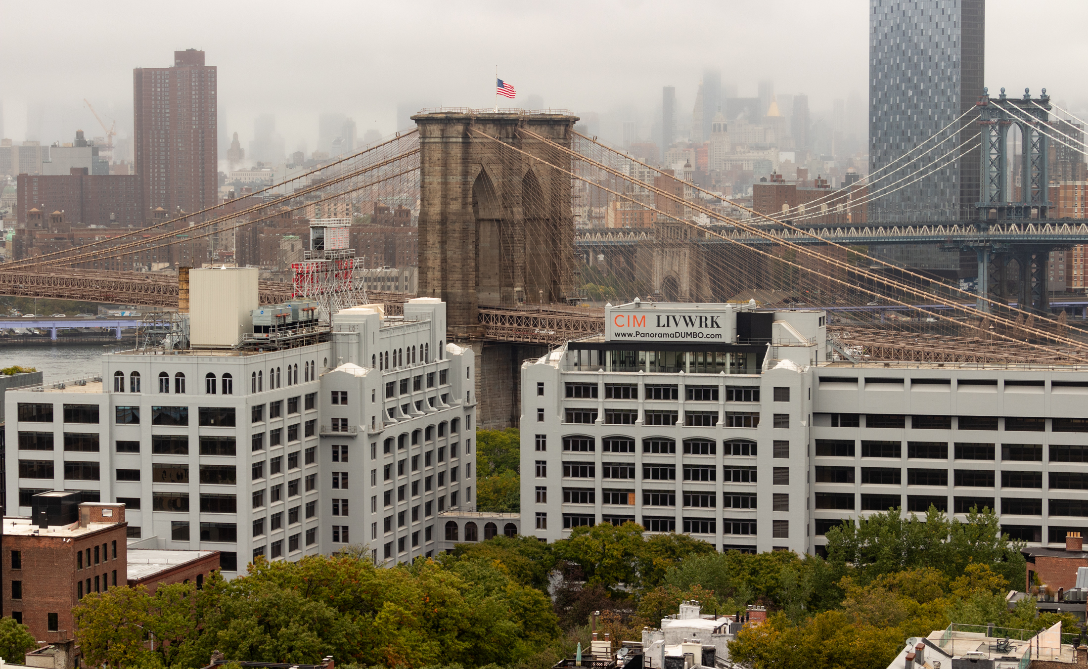 an aerial view showing the brooklyn bridge and the livwrk complex