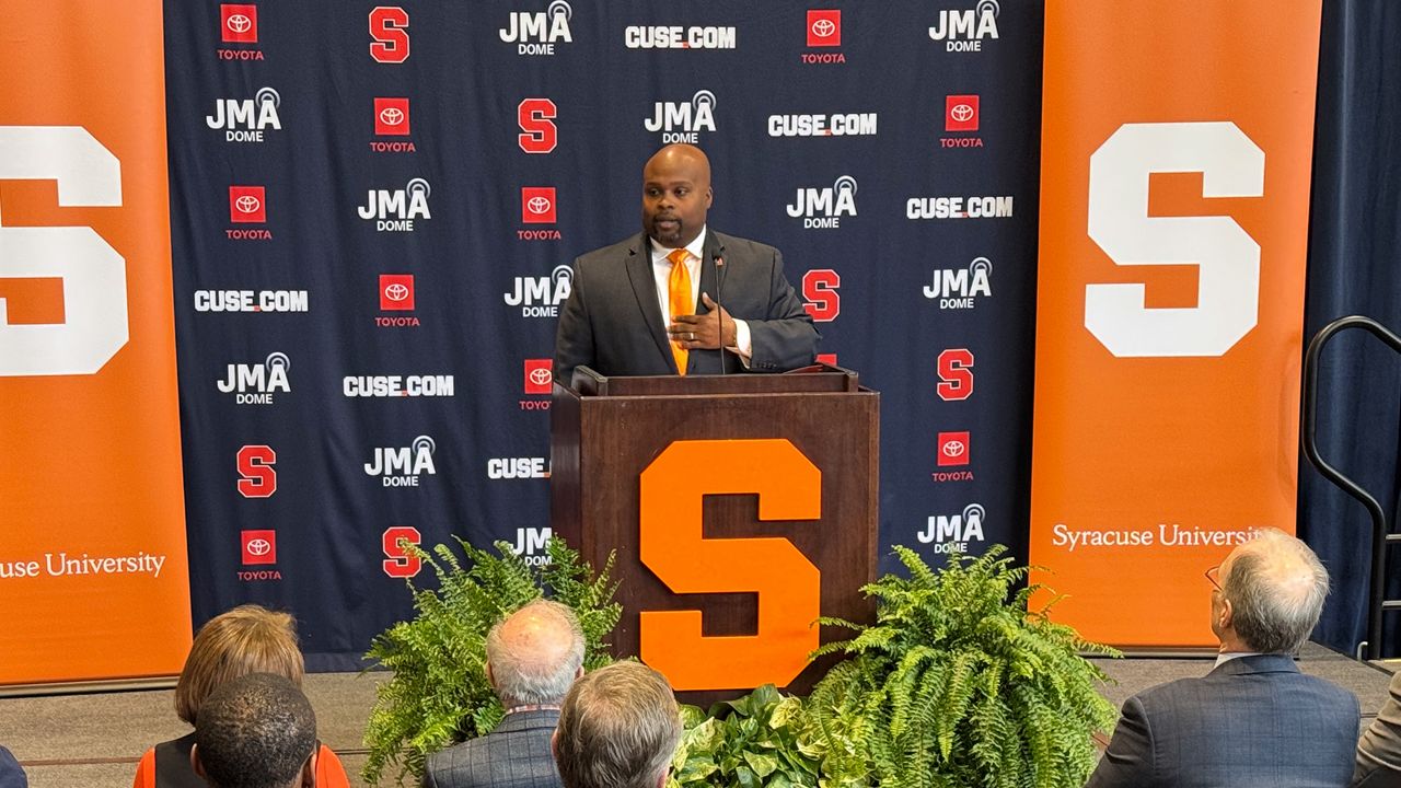 bryan blair speaks at introduction as syracuse athletic director