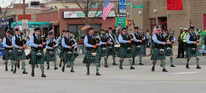 bagpipers marching in a parade