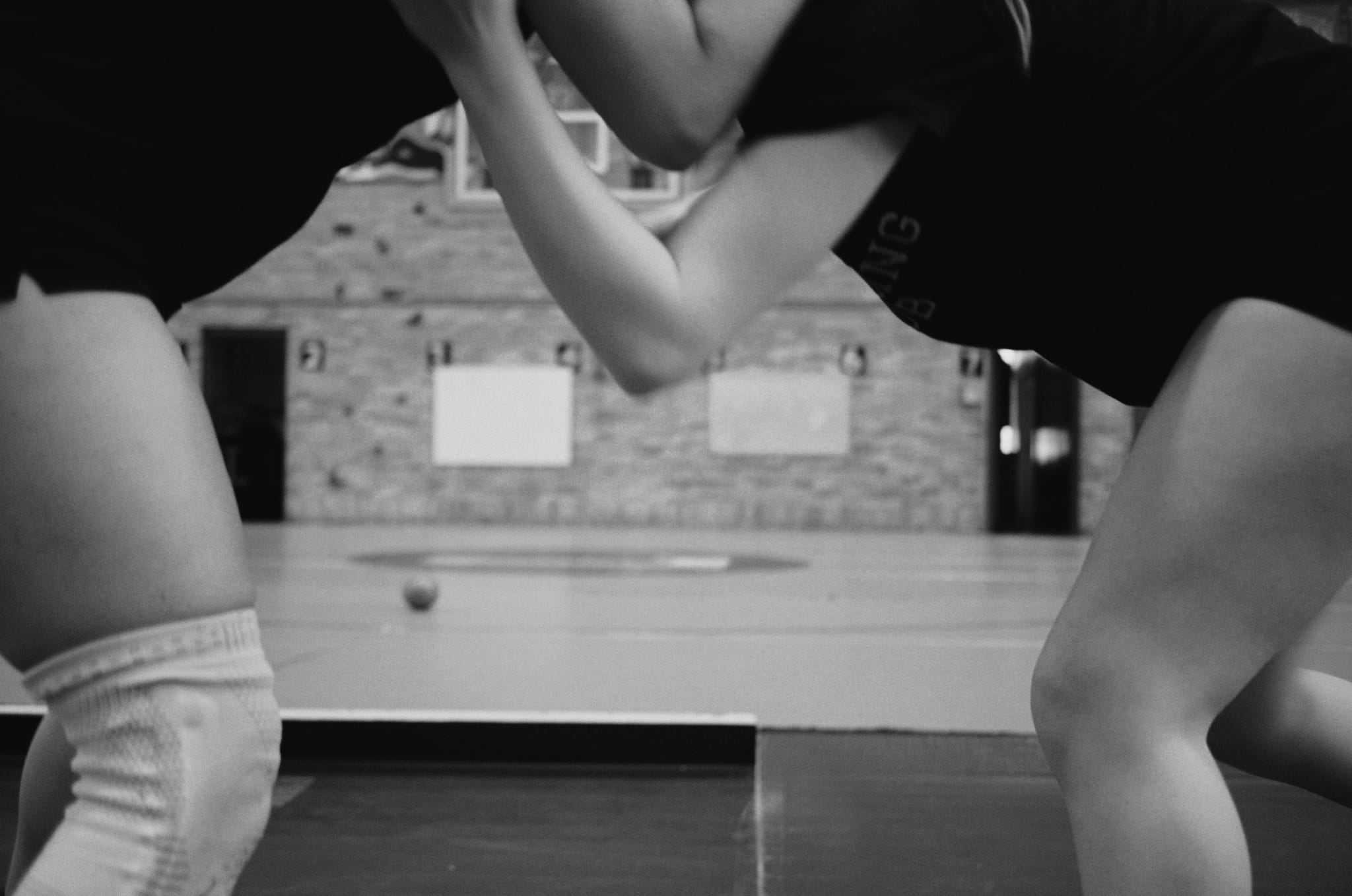 two athletes engaged in a wrestling match