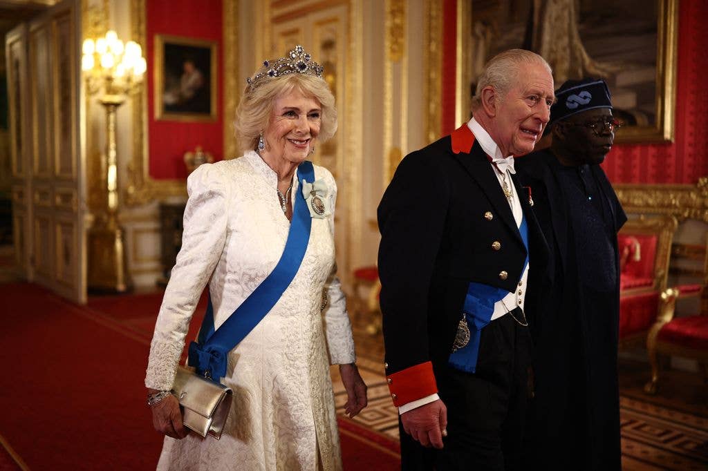 Queen Camilla, Britain's King Charles III and Nigeria's President Bola Tinubu arrive to attend a State Banquet in St George's Hall, at Windsor Castle, in Windsor, on March 18, 2026, on the first day of a two-day State Visit to the United Kingdom by Nigeria's President.
