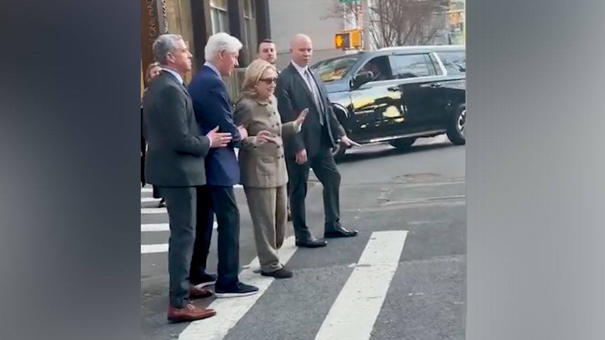 Bill and Hillary Clinton on crosswalk