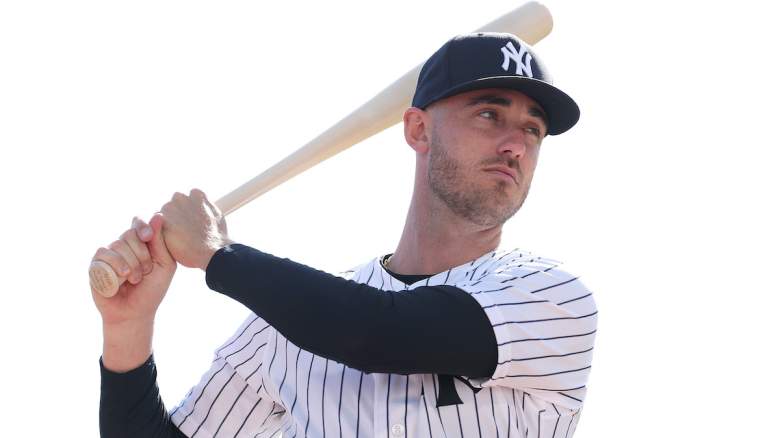 Cody Bellinger swings a bat amid reports he is injured.