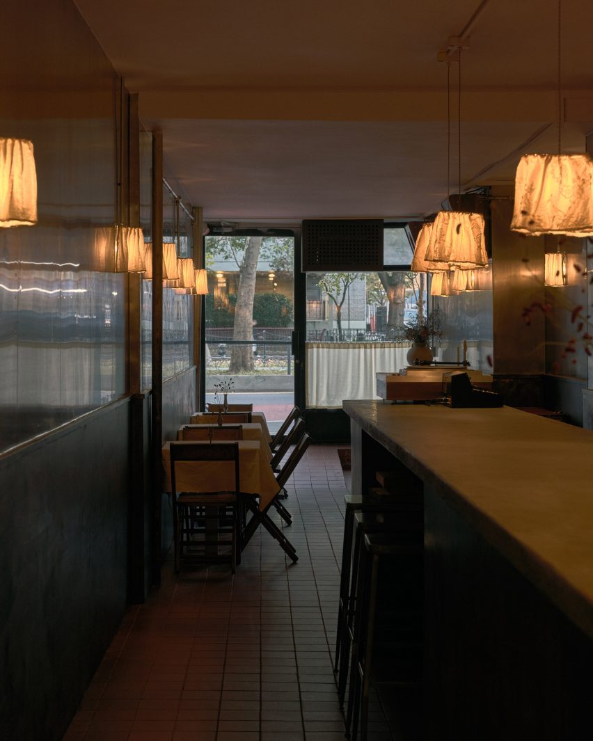 A wine bar and listening lounge with dim lighting 