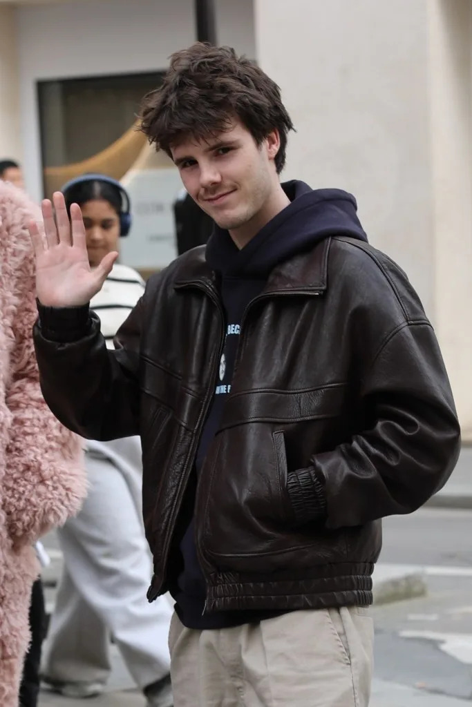 Cruz (pictured here earlier this month in Paris) also sings, “Loneliest boy, I hope that you’re listening / Don’t push all your friends away, when we’re tryna show you love.” BACKGRID