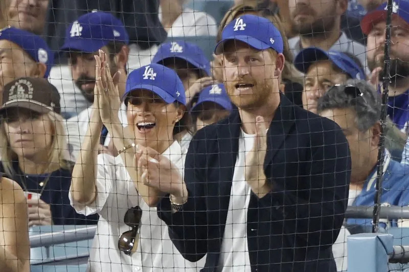 Prince Harry and Meghan Markle, seen cheering the Los Angeles Dodgers in October in Los Angeles, executive produced "Cookie Queens." File Photo by John Angelillo/UPI