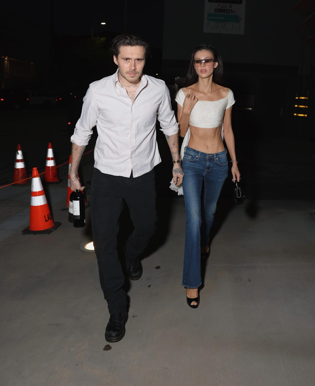 In January, Brooklyn (seen above with wife Nicola Peltz in February) reportedly warned his famous parents to only contact him via a lawyer. EastLA / BACKGRID